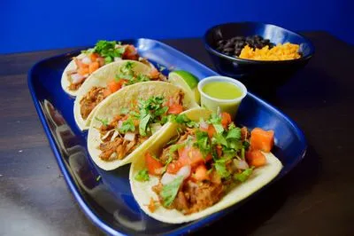 Birria tacos with consommé
